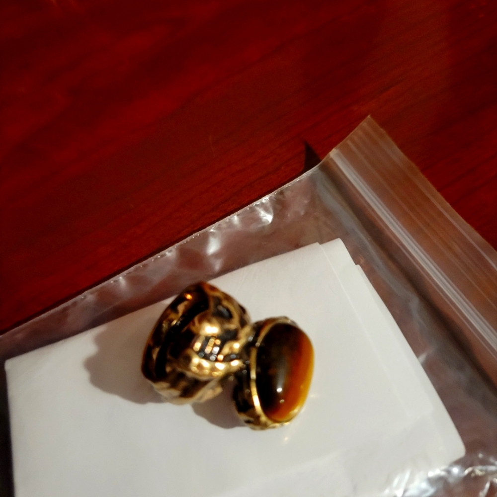 Avon ring with brown stone